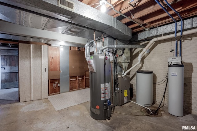 505 N 7th St, Eldridge, IA 52748 - unfinished below grade area with water heater and a water softener system