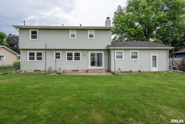 505 N 7th St, Eldridge, IA 52748 - back of house featuring a chimney