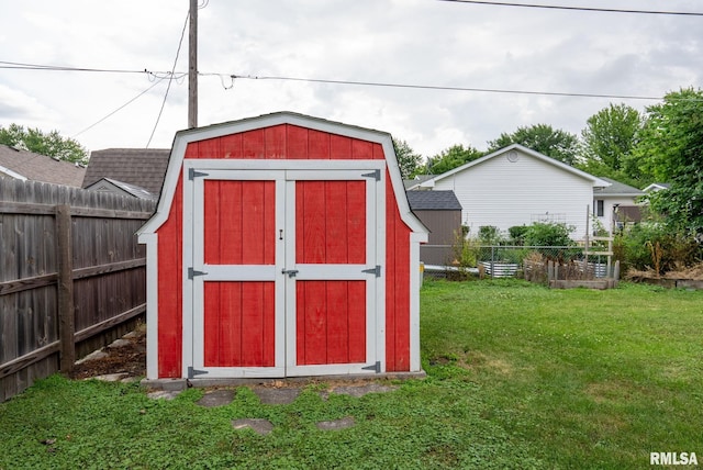 505 N 7th St, Eldridge, IA 52748 - view of shed with a fenced backyard