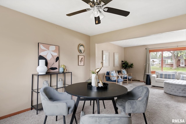 505 N 7th St, Eldridge, IA 52748 - dining space with light colored carpet and a ceiling fan