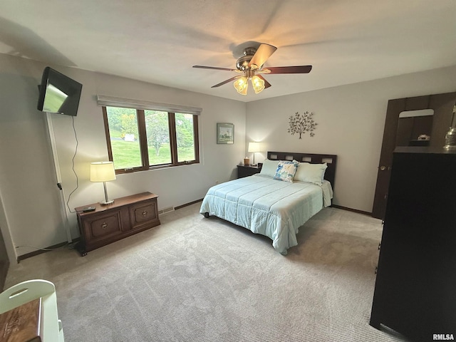 3715 35th St Unit 3, Moline, IL 61265 - bedroom featuring light carpet and ceiling fan