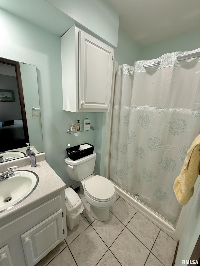 3715 35th St Unit 3, Moline, IL 61265 - bathroom featuring vanity, tile patterned floors, and a shower with shower curtain