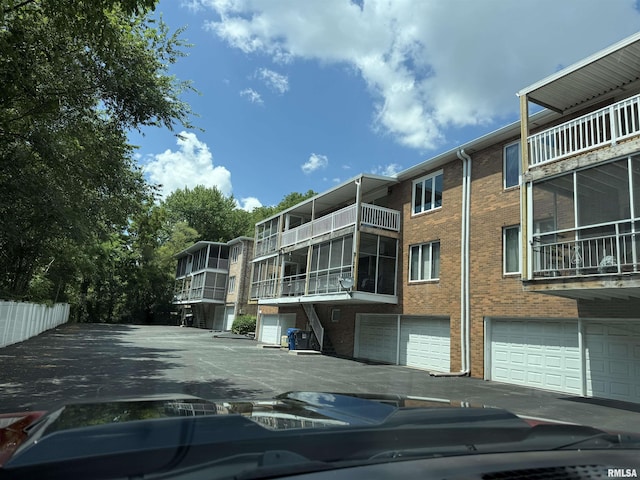 3715 35th St Unit 3, Moline, IL 61265 - view of apartment building / complex featuring an attached garage