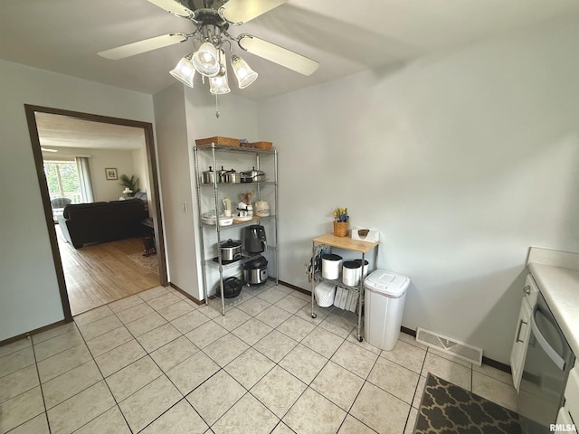 3715 35th St Unit 3, Moline, IL 61265 - dining area with a ceiling fan and light tile patterned floors