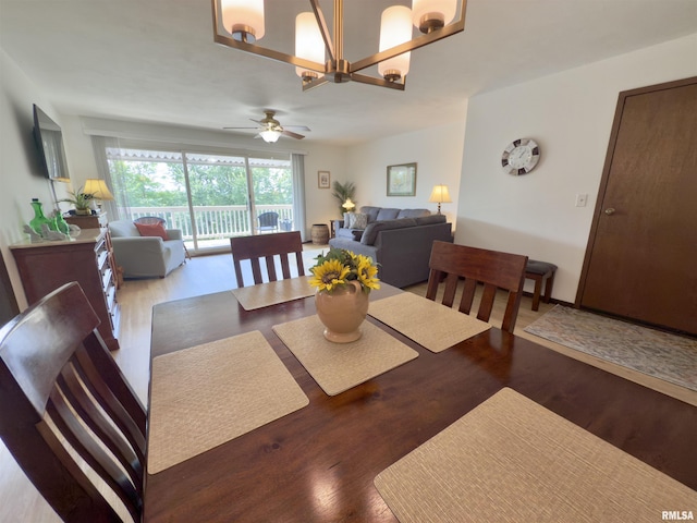 3715 35th St Unit 3, Moline, IL 61265 - dining space featuring a ceiling fan and wood finished floors