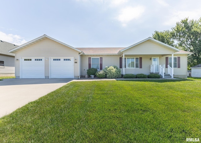 95 N 18th St, Clinton, IA 52732 - ranch-style home with a garage, driveway, a front lawn, and covered porch