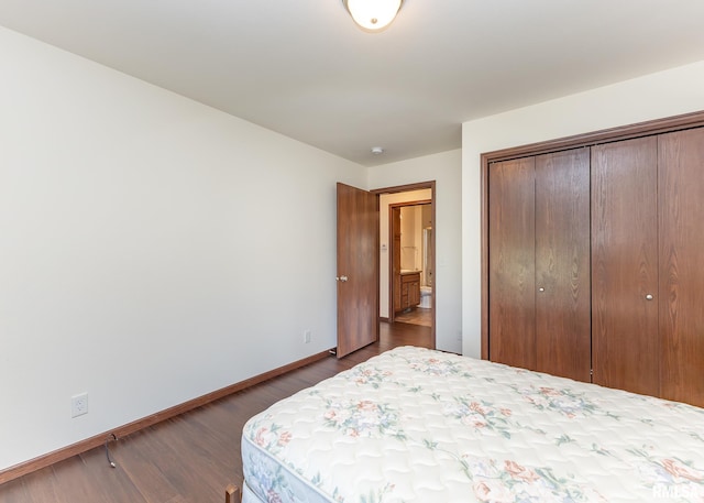 95 N 18th St, Clinton, IA 52732 - bedroom featuring a closet and dark wood-style flooring