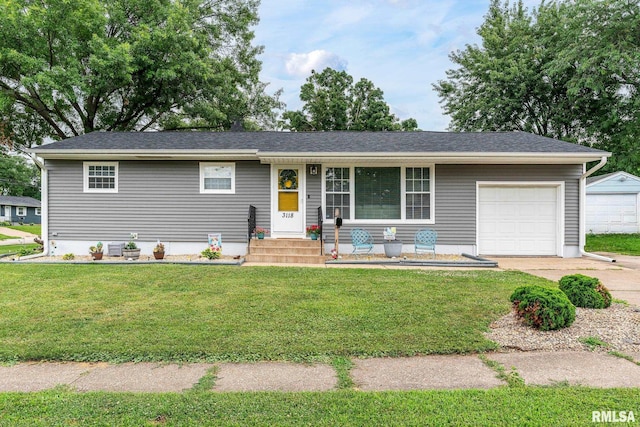 3118 W Denison Ave, Davenport, IA 52804 - single story home featuring an attached garage, a front lawn, and driveway