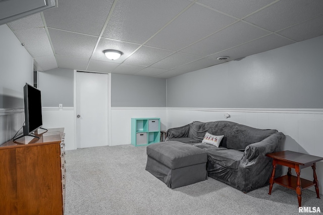 3118 W Denison Ave, Davenport, IA 52804 - living area with a paneled ceiling, carpet, and wainscoting