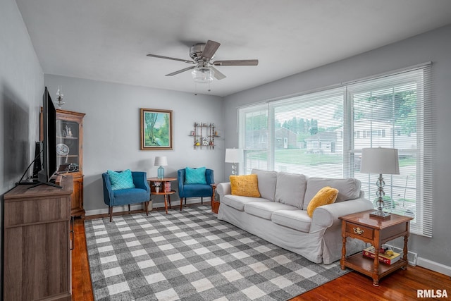 3118 W Denison Ave, Davenport, IA 52804 - living room featuring a ceiling fan and light wood finished floors