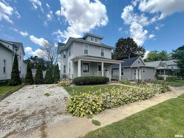 1426 32nd St, Rock Island, IL 61201 - traditional style home featuring covered porch and a front lawn