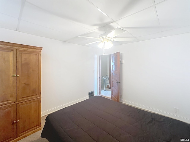 1426 32nd St, Rock Island, IL 61201 - unfurnished bedroom with ceiling fan and baseboards