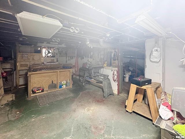 1426 32nd St, Rock Island, IL 61201 - unfinished basement with a workshop area
