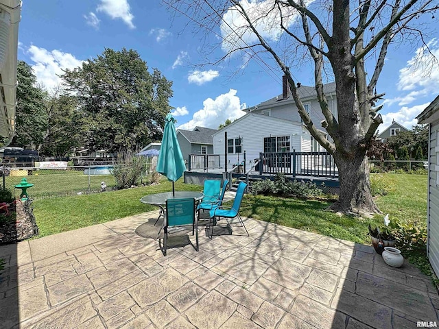 1426 32nd St, Rock Island, IL 61201 - view of patio / terrace featuring a deck and outdoor dining space