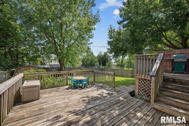 2917 W 65th St, Davenport, IA 52806 - wooden deck with a fenced backyard and grilling area