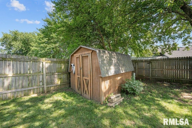 2917 W 65th St, Davenport, IA 52806 - view of shed featuring a fenced backyard