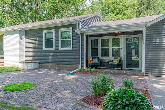 1715 65th Ave W, Rock Island, IL 61201 - view of front facade with a shingled roof