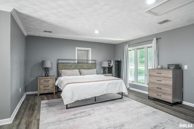 1715 65th Ave W, Rock Island, IL 61201 - bedroom with dark wood finished floors, attic access, and recessed lighting