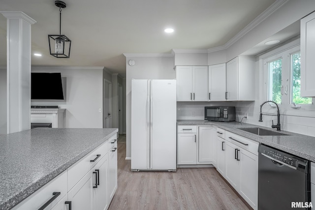 1715 65th Ave W, Rock Island, IL 61201 - kitchen with black appliances, crown molding, decorative backsplash, white cabinetry, and recessed lighting