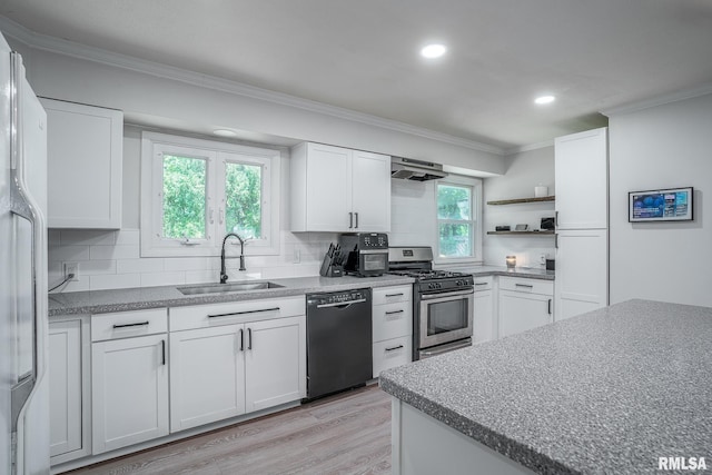1715 65th Ave W, Rock Island, IL 61201 - kitchen featuring dishwasher, stainless steel gas stove, freestanding refrigerator, crown molding, and under cabinet range hood