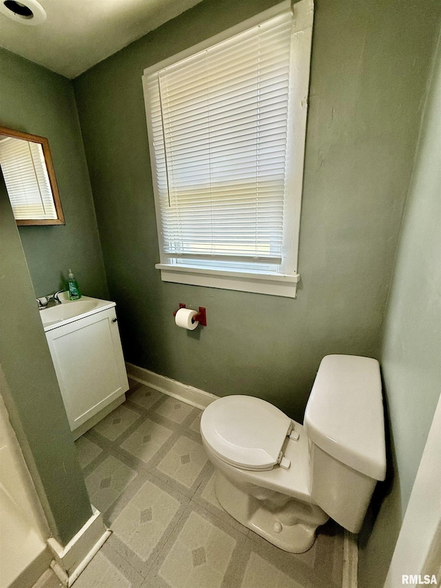 304 E Ames St, Yates City, IL 61572 - bathroom with toilet and baseboards