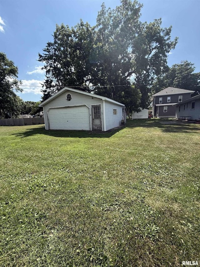302 E Ames St, Yates City, IL 61572 - view of yard featuring a garage and an outbuilding