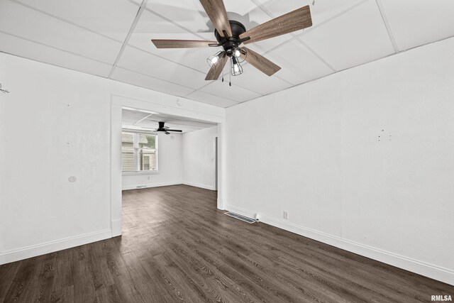 404 5th St, Sherrard, IL 61281 - empty room featuring dark wood finished floors and a ceiling fan