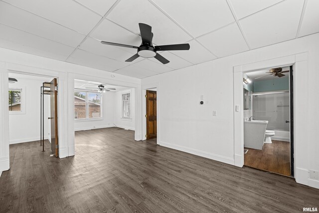 404 5th St, Sherrard, IL 61281 - unfurnished living room with ceiling fan and dark wood-type flooring