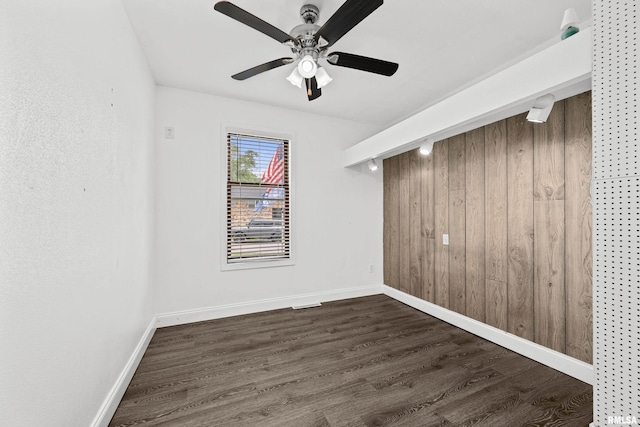 404 5th St, Sherrard, IL 61281 - empty room with dark wood-style flooring and a ceiling fan