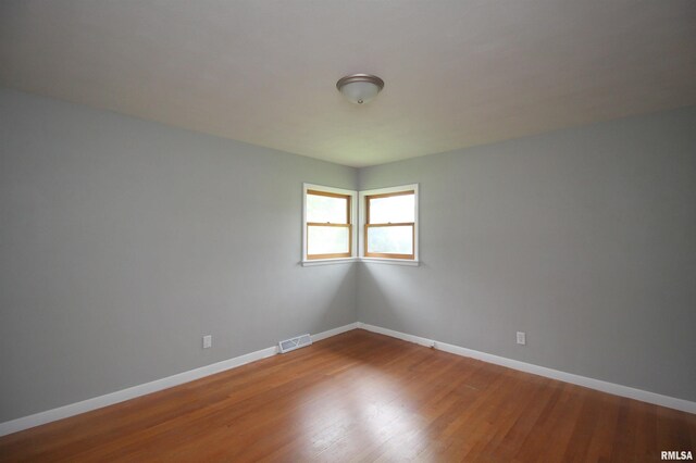 1524 W 4th St, Milan, IL 61264 - unfurnished room featuring baseboards and wood finished floors