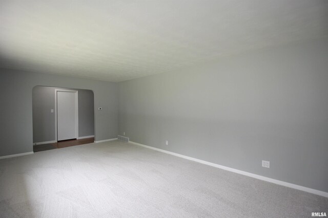 1524 W 4th St, Milan, IL 61264 - carpeted empty room with baseboards