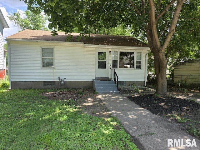 1405 26th St, Rock Island, IL 61201 - view of front facade featuring entry steps and a shingled roof