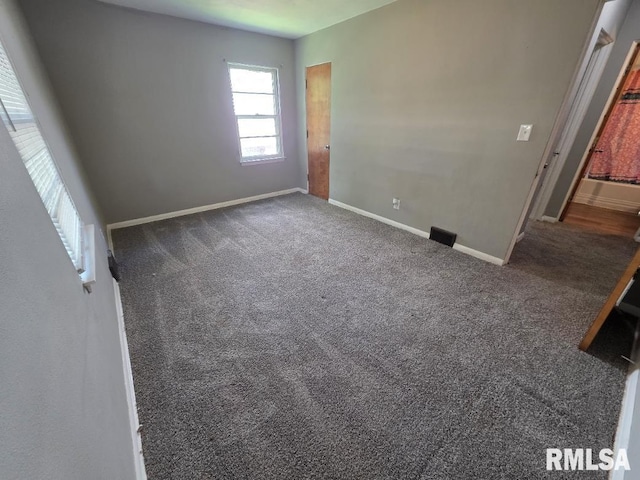 1405 26th St, Rock Island, IL 61201 - spare room featuring carpet floors
