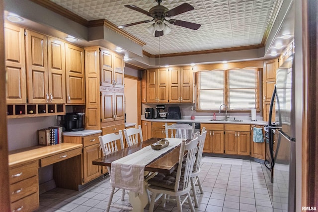 214 N Chestnut St, Mendon, IL 62351 - kitchen featuring ornamental molding, light tile patterned flooring, ceiling fan, light countertops, and built in study area