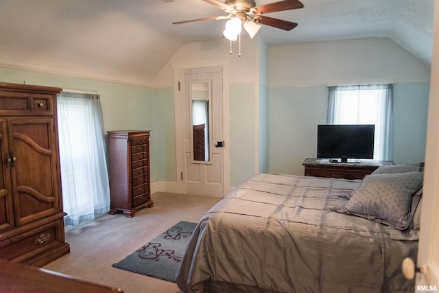 214 N Chestnut St, Mendon, IL 62351 - carpeted bedroom with vaulted ceiling and ceiling fan
