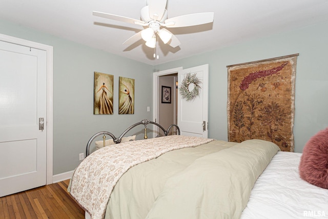 3205 Crestline Dr, Davenport, IA 52803 - bedroom with hardwood / wood-style flooring and a ceiling fan