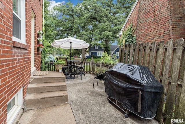 3205 Crestline Dr, Davenport, IA 52803 - view of patio featuring a grill