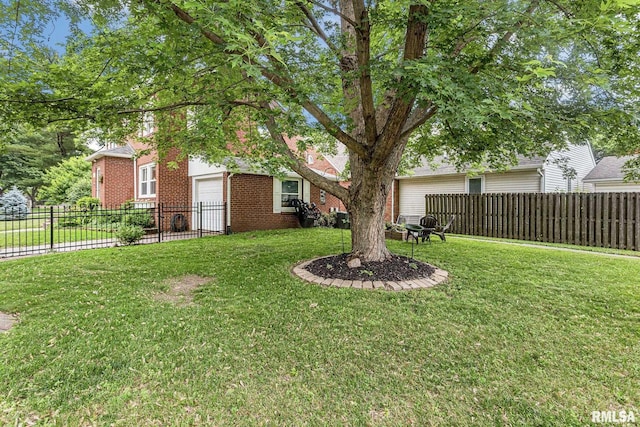 3205 Crestline Dr, Davenport, IA 52803 - view of yard featuring an attached garage