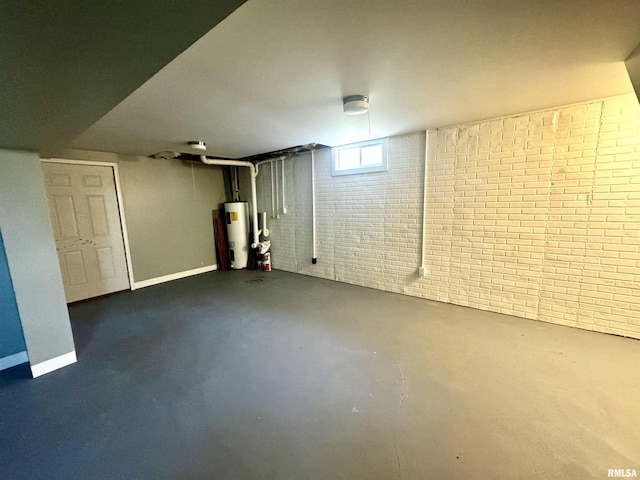202 S 10th Ave, New Windsor, IL 61465 - basement with electric water heater and brick wall