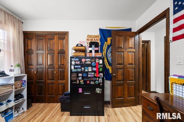 833 Robin Rd, Muscatine, IA 52761 - office space featuring wood finished floors