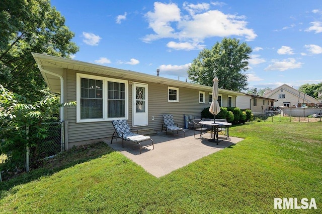 833 Robin Rd, Muscatine, IA 52761 - rear view of house with a patio area