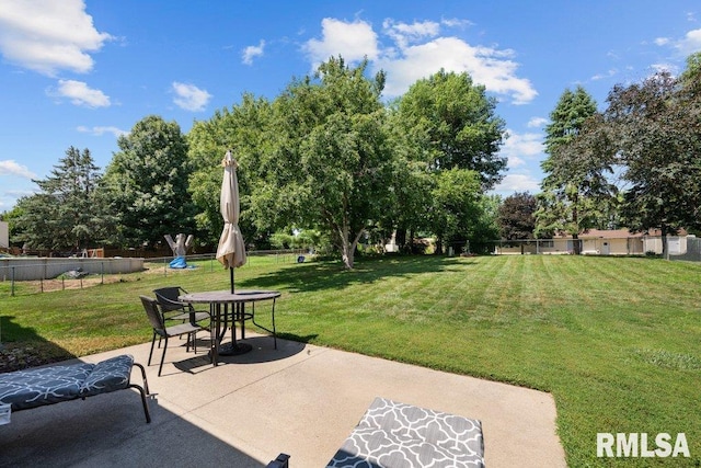 833 Robin Rd, Muscatine, IA 52761 - view of yard with a patio area, outdoor dining area, and view of scattered trees