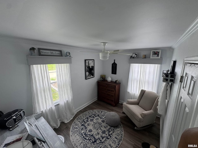 3125 Pershing Blvd, Clinton, IA 52732 - living area featuring crown molding, wood finished floors, and ceiling fan