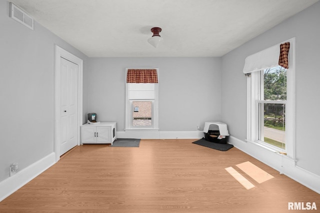 1309 5th St, Orion, IL 61273 - unfurnished bedroom featuring wood finished floors and baseboards
