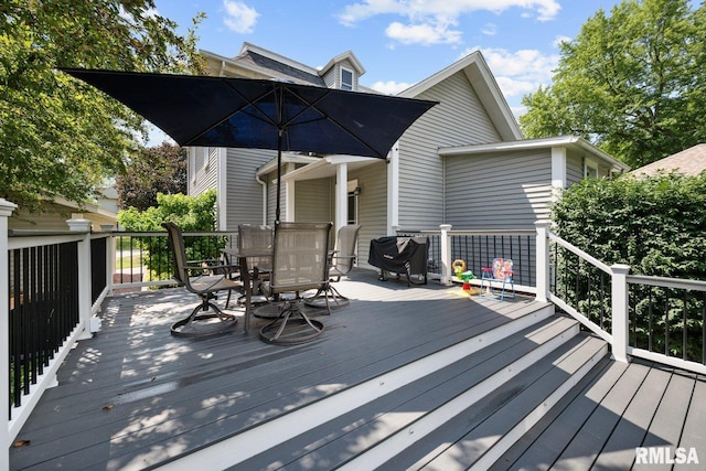 1309 5th St, Orion, IL 61273 - wooden deck featuring outdoor dining space