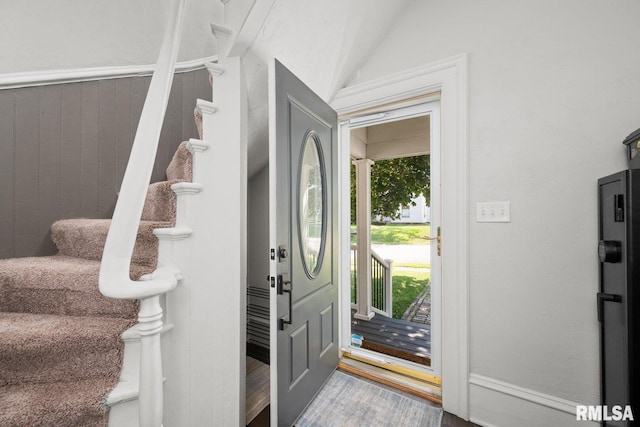 1309 5th St, Orion, IL 61273 - entryway with stairway, wood finished floors, and lofted ceiling