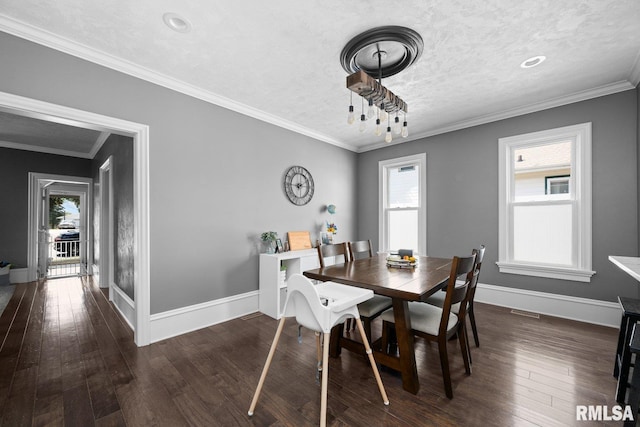 1309 5th St, Orion, IL 61273 - dining area featuring hardwood / wood-style flooring and crown molding