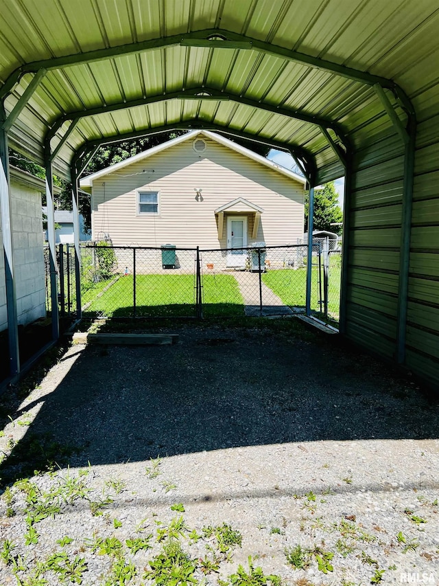 104 S 8th St, Herrin, IL 62948 - view of vehicle parking with a detached carport