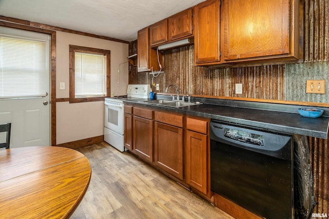 1904 E D St, West Frankfort, IL 62896 - kitchen featuring black dishwasher, white range with electric cooktop, brown cabinets, dark countertops, and light wood-style floors