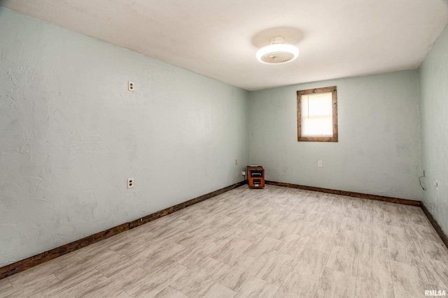 1904 E D St, West Frankfort, IL 62896 - spare room with baseboards and light flooring